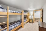 Entry level bunk room with 4 twin beds and 1 twin trundle 